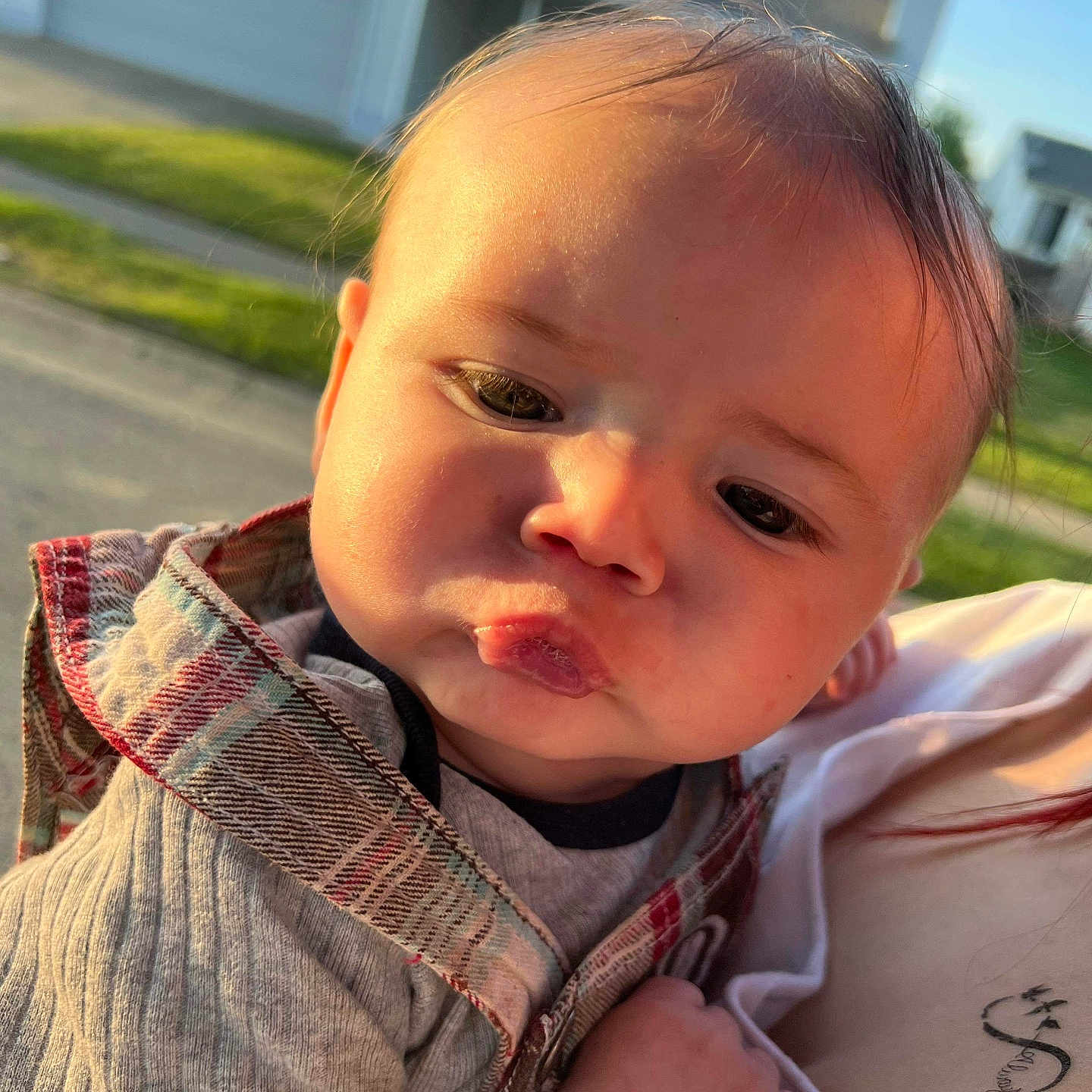 Emmerson is registered to the contest to win money with this photo: baby, city, clothing, coat, face, frown, grass, happy, head, jacket, pants, person, photography, plant, portrait, road, sad, street, t_shirt, urban