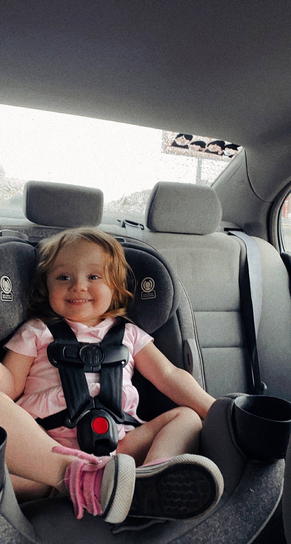 Rosalynn is registered to the contest to win money with this photo: auto_part, automotive_design, automotive_exterior, car, car_seat, car_seat_cover, child, comfort, head_restraint, joy, motor_vehicle, person, personal_luxury_car, seat_belt, smile, steering_part, steering_wheel, toddler, vehicle, vehicle_door