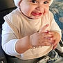 baby, bib, car_seat, child, clapping, clothing, cute, face, hands, happy, hat, indoor, jeans, person, pom_pom, ripped_jeans, seatbelt, seated, smiling, young_child
