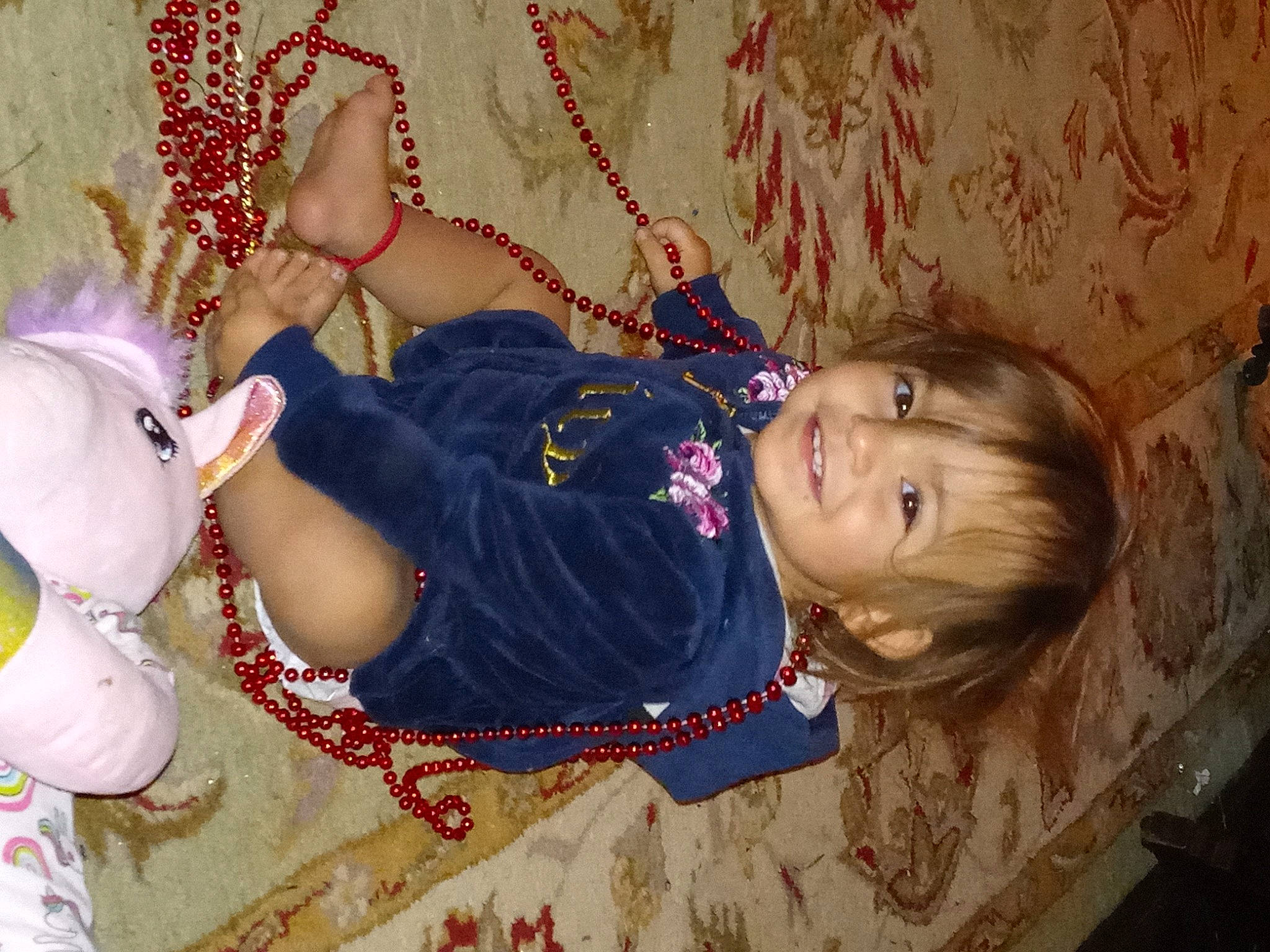 Gabryella is registered to the contest to win money with this photo: baby, baby_toddler_clothing, cheek, child, eye, fashion_accessory, fun, happy, head, iris, jewellery, joy, magenta, pattern, person, sitting, skin, sleeve, smile, toddler