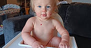 Ellia joined the competition — help win amazing prizes! baby_food, blonde_hair, blue_eyes, child, curious, cute, feeding_time, high_chair, home, indoor, living_room, messy_face, person, raspberries, shelf, small_child, sofa, toddler, toy, unclothed_upper_body