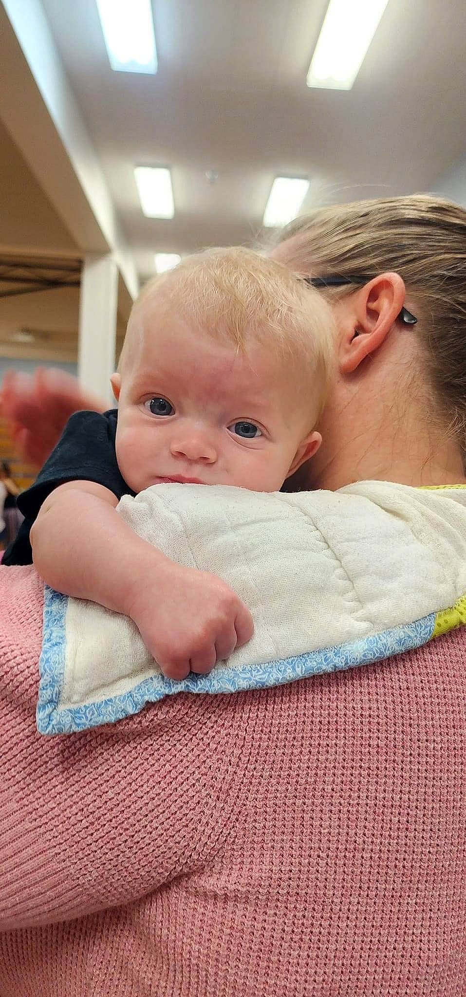 Raven joined the competition — help win amazing prizes! abdomen, baby, baby_toddler_clothing, blond, cheek, child, comfort, eyelash, iris, linens, nose, person, room, sitting, skin, t_shirt, toddler, vacation