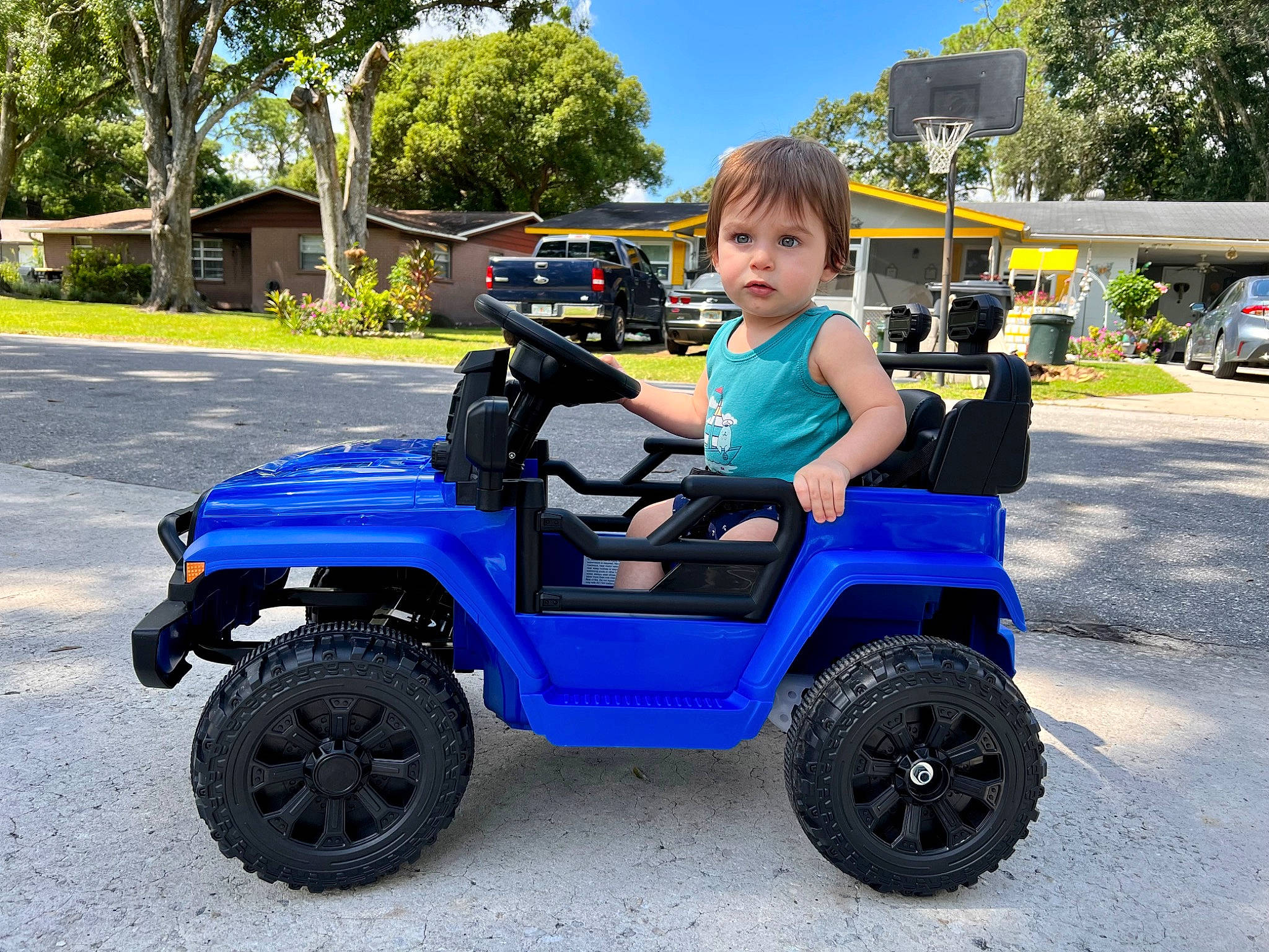 Ian joined the competition — help win amazing prizes! alloy_wheel, automotive_design, automotive_tire, bumper, car, fender, hood, jeans, land_vehicle, motor_vehicle, person, plant, rim, sky, synthetic_rubber, tire, tread, tree, vehicle, wheel