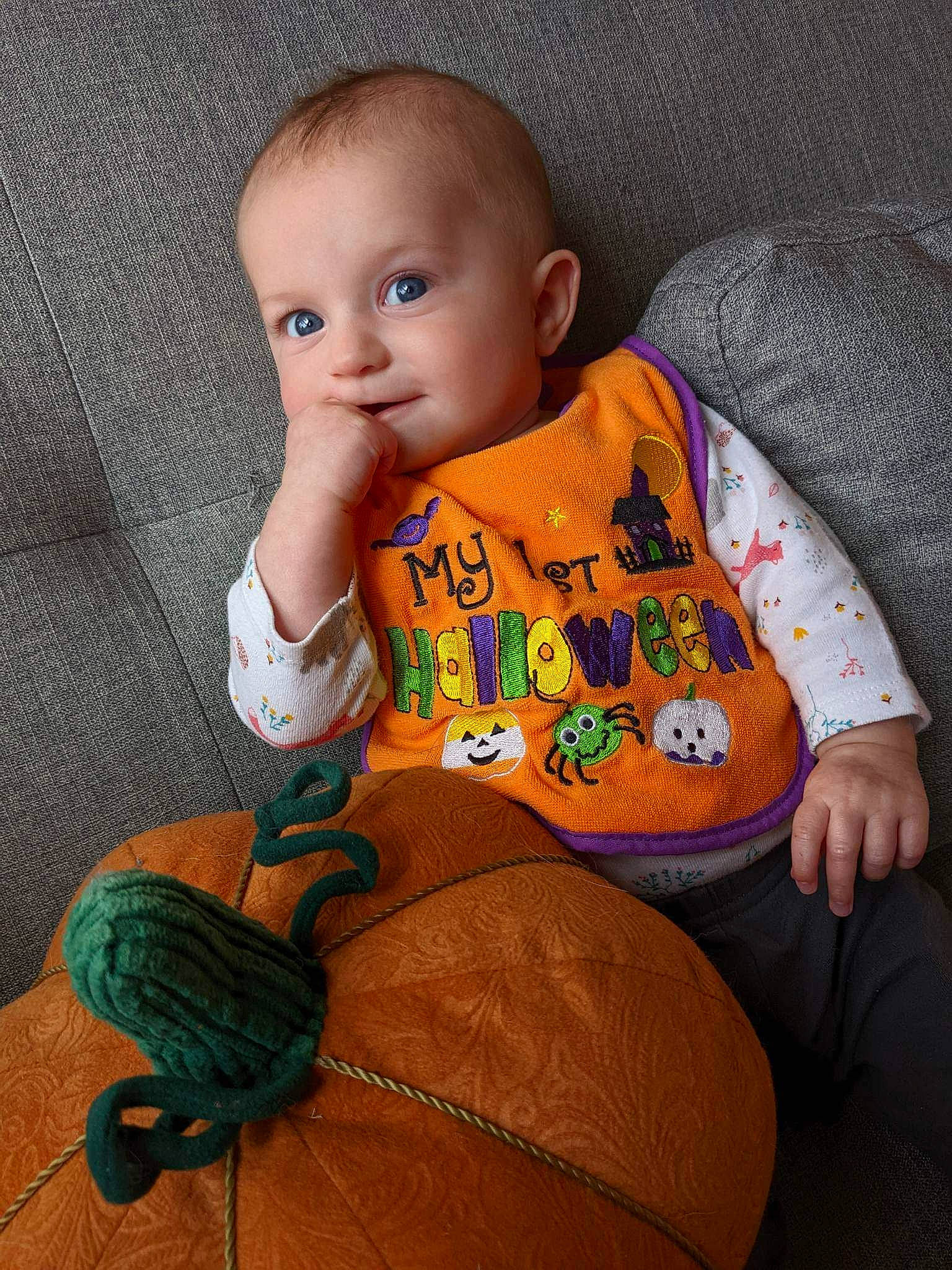 Avery joined the competition — help win amazing prizes! arm, baby_toddler_clothing, cheek, chin, comfort, cucurbita, eye, facial_expression, finger, hairstyle, hand, head, iris, nose, orange, person, pumpkin, skin, sleeve, standing