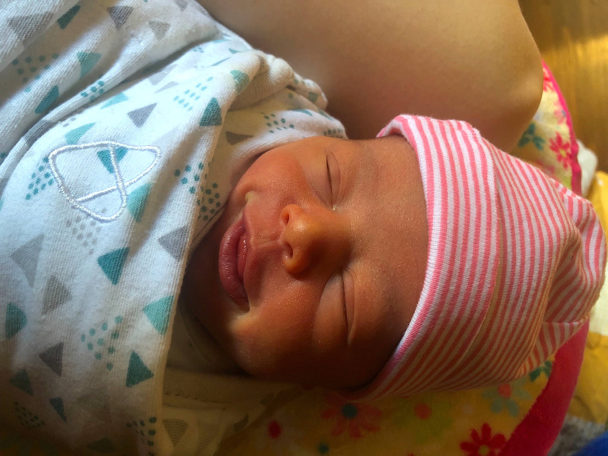 Maelynn is registered to the contest to win money with this photo: baby, baby_products, baby_toddler_clothing, bedtime, cheek, child, comfort, ear, hand, head, headwear, human_body, iris, linens, lip, mouth, nose, person, room, skin