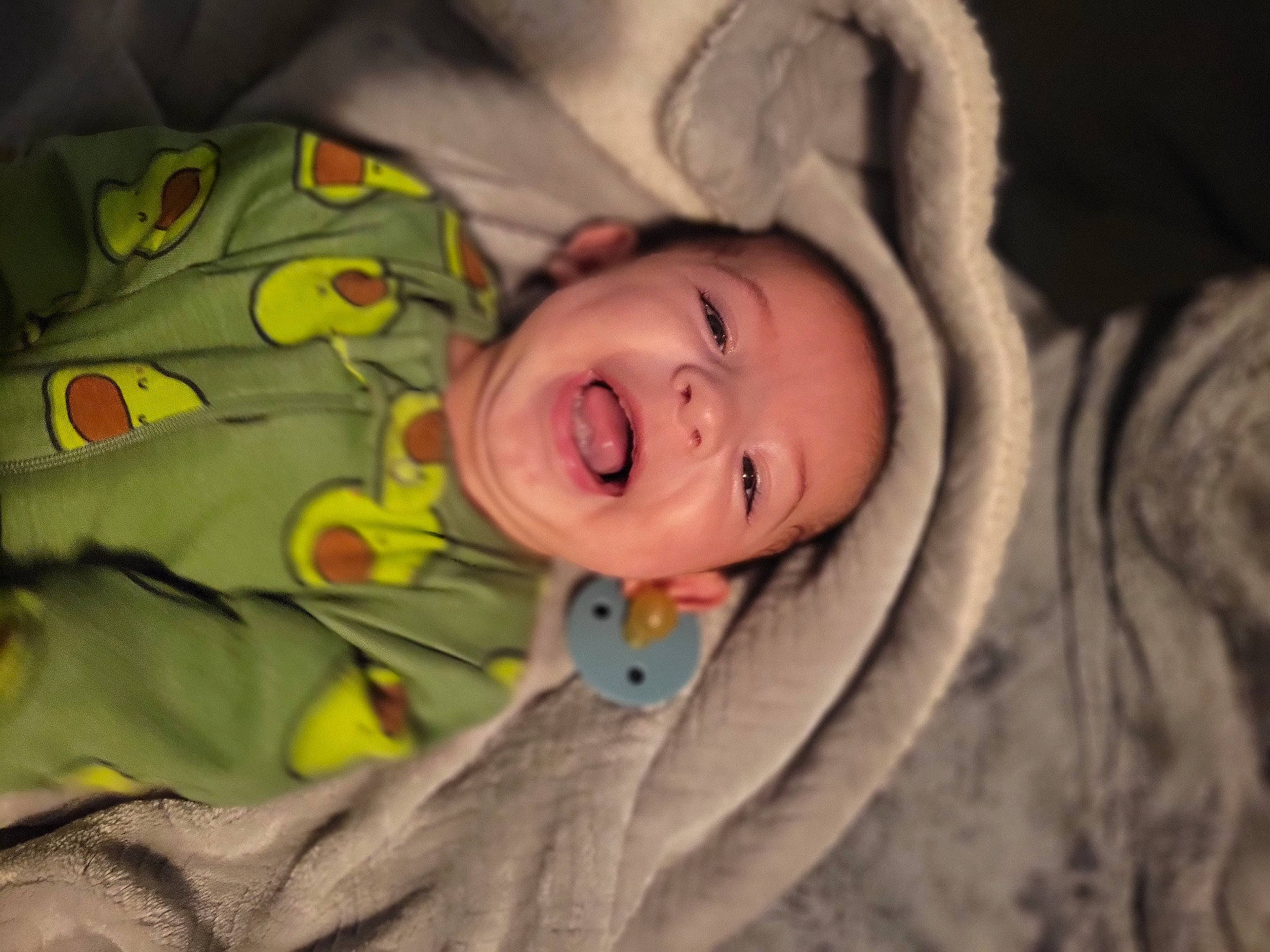 Eleazar is registered to the contest to win money with this photo: baby, baby_toddler_clothing, cheek, comfort, eye, face, flash_photography, happy, head, human_body, iris, linens, nose, person, plant, sleeve, smile, textile, toddler, tree