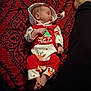 Nash is registered to the contest to win money with this photo: baby, sleeping, pajamas, christmas, red, white, reindeer, blanket, patterned, infant, pacifier, legs, black_pants, cozy, indoors, cute, holiday, resting, child, soft