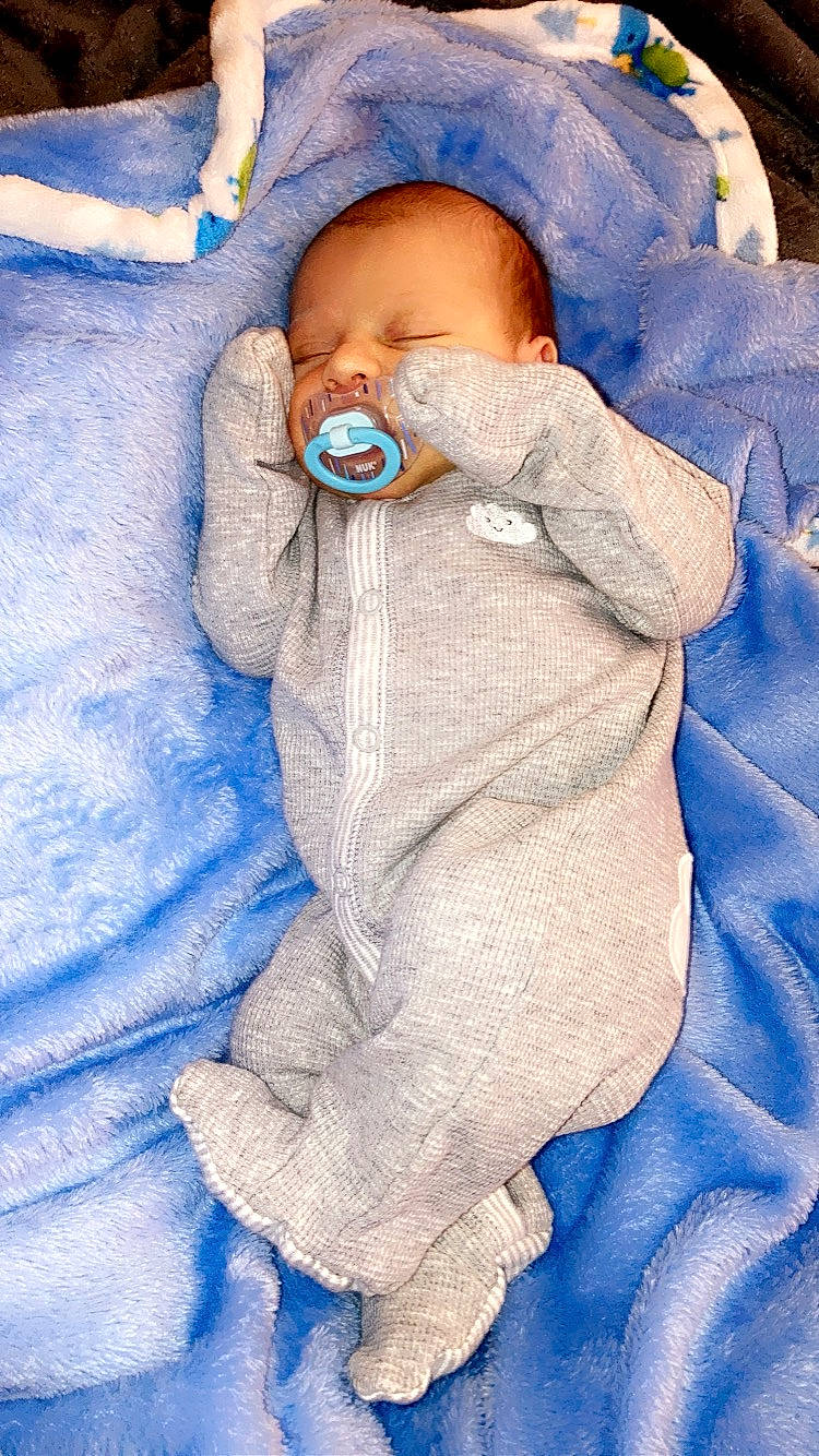 Jaxson is registered to the contest to win money with this photo: baby, child, nose, person, sleep, toddler