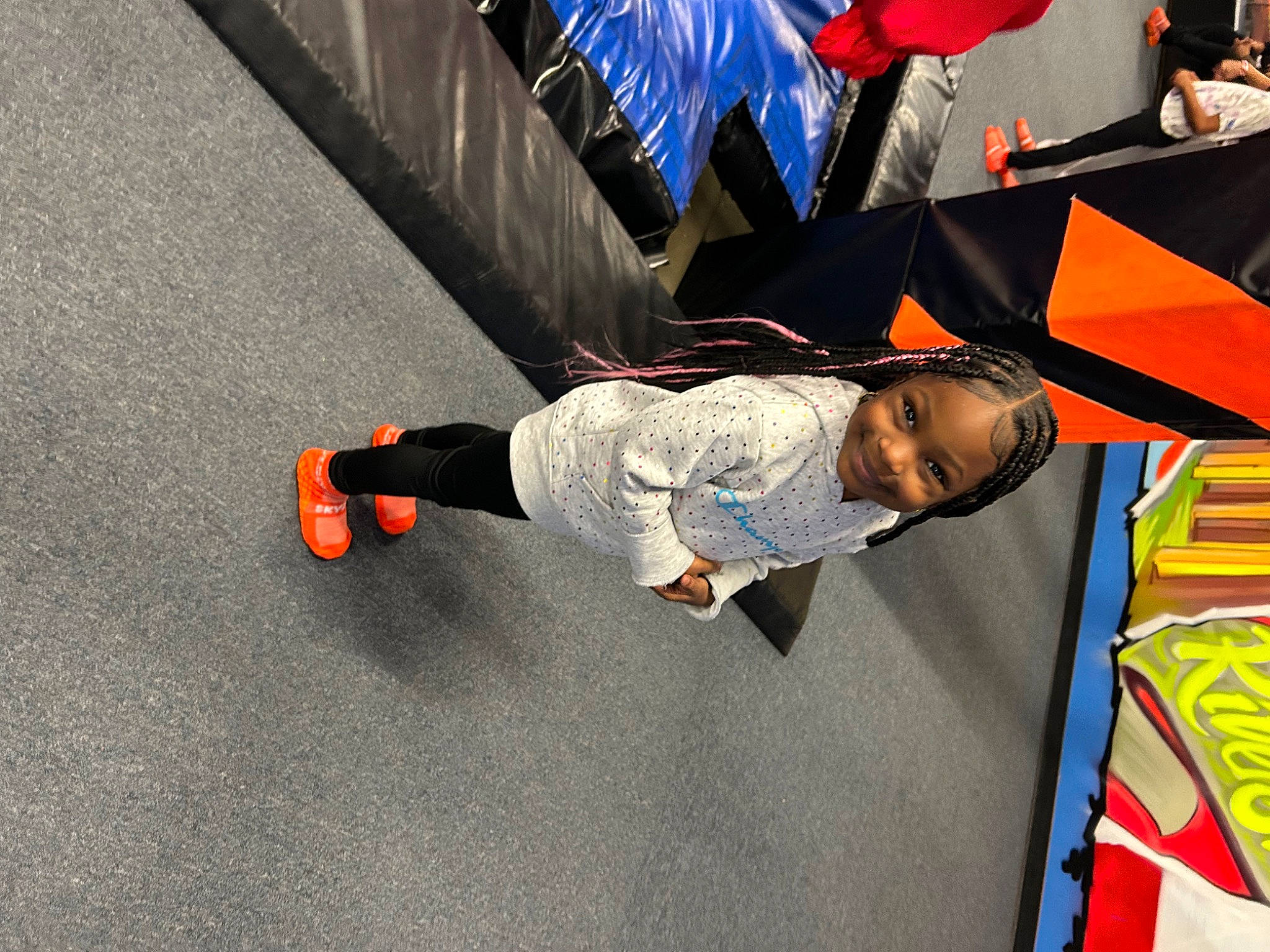 Alaysia joined the competition — help win amazing prizes! asphalt, automotive_design, carmine, child, competition_event, concrete, event, flag, flooring, fun, games, joy, leisure, person, public_event, recreation, road_surface, rolling, sportswear, t_shirt