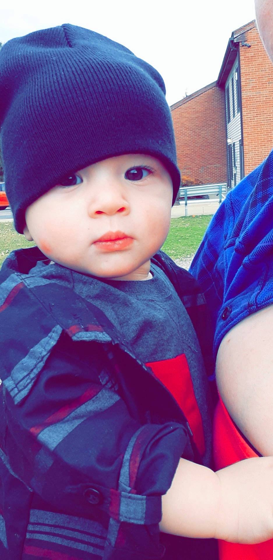 Zechariah is registered to the contest to win money with this photo: baby, beanie, bonnet, cap, cheek, child, cool, eye, face, hat, head, headgear, headwear, knit_cap, lip, magenta, nose, person, play, skin