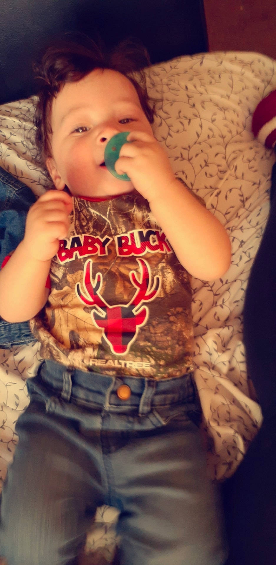 Zechariah is registered to the contest to win money with this photo: abdomen, arm, cheek, chest, child, cool, flesh, gesture, hand, lip, long_hair, mouth, neck, nose, person, photography, toddler, trunk