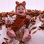 Everleigh joined the competition — help win amazing prizes! baby, infant, smiling, autumn, fall_leaves, headband, bow, clothing, blanket, feet, hands, sign, months, cute, happy, indoors, portrait, seasonal, baby_girl, sitting
