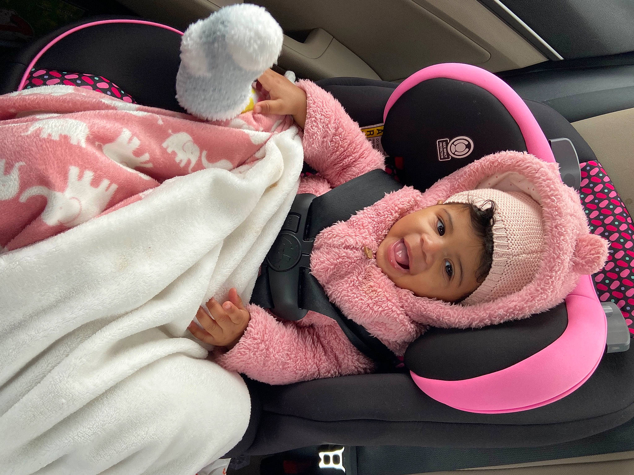 Madisyn joined the competition — help win amazing prizes! auto_part, baby, baby_products, baby_sleeping, baby_toddler_clothing, car_seat, child, comfort, facial_expression, family_car, headwear, human_body, linens, motor_vehicle, mouth, person, pink, room, skin, smile