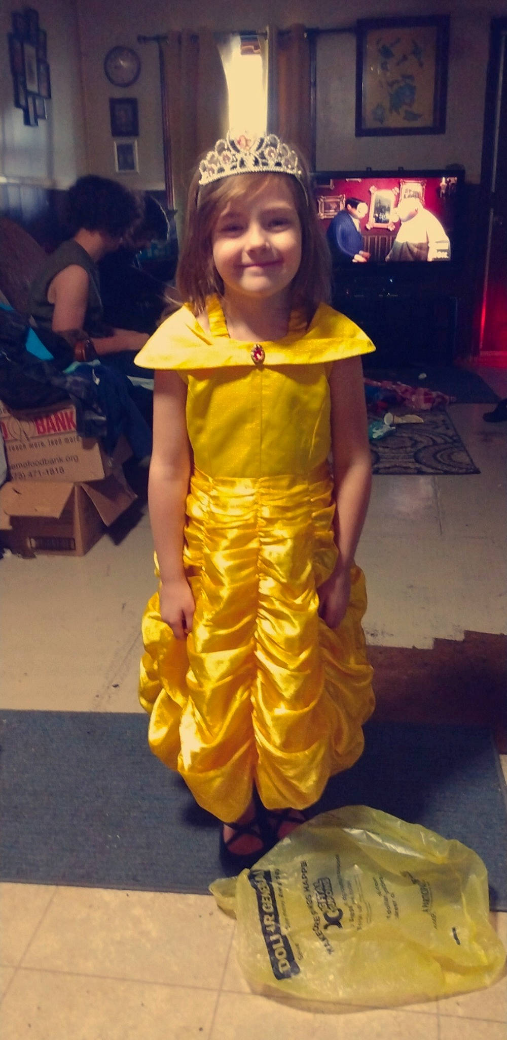 Kinsley is registered to the contest to win money with this photo: child, costume, costume_design, crown, event, fashion_accessory, fashion_design, flooring, formal_wear, fun, happy, headpiece, jewellery, joy, luggage_and_bags, necklace, person, personal_protective_equipment, smile, tiara