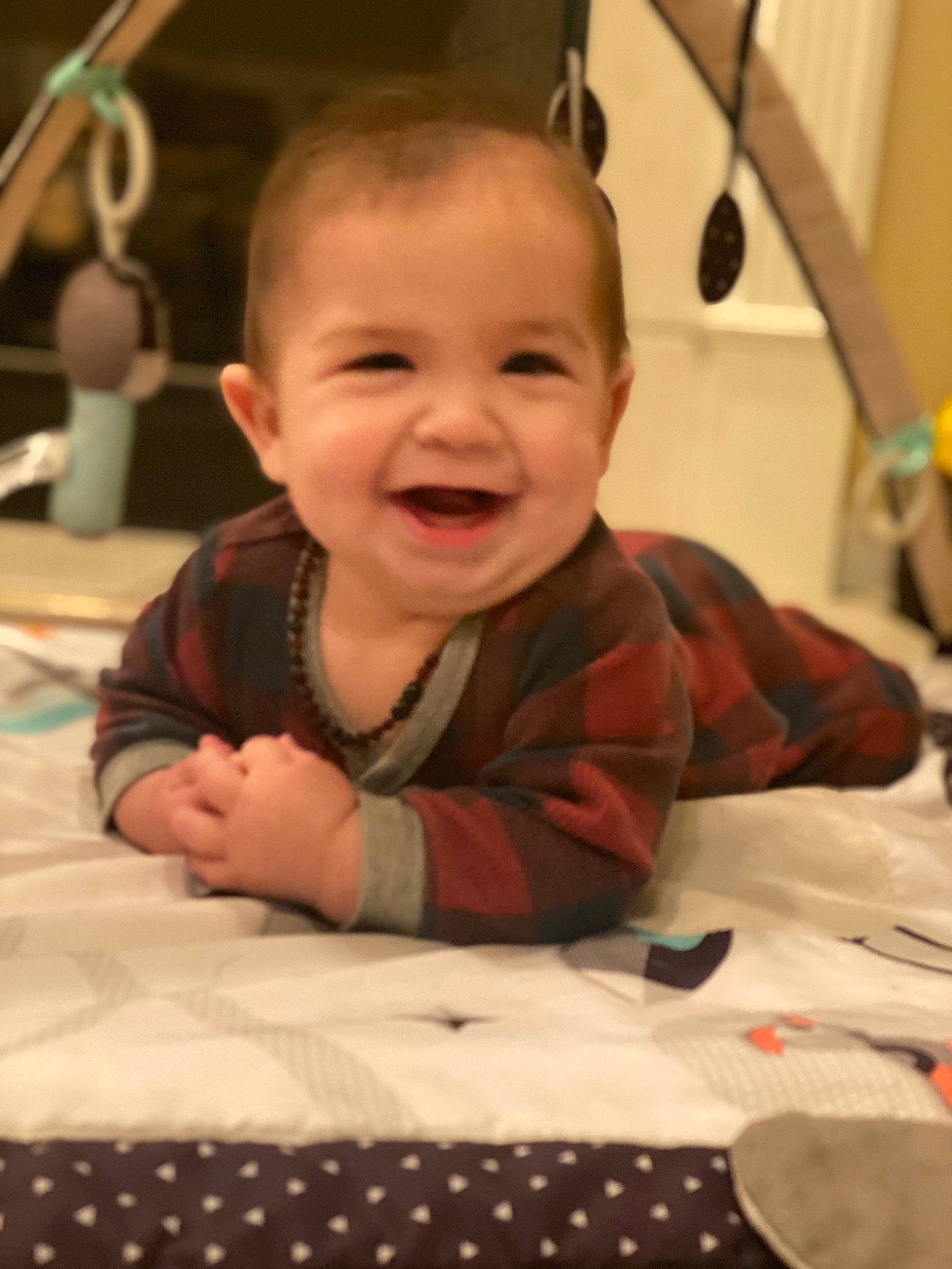 Creed is registered to the contest to win money with this photo: baby, baby_toddler_clothing, cheek, comfort, face, finger, fun, happy, head, human_body, iris, joy, mammal, mouth, nose, person, skin, smile, tableware, toddler