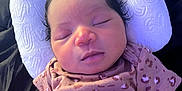 Chosenn is registered to the contest to win money with this photo: baby, child, clothing, cute, face, head, indoor, infant, leopard_print, newborn, pattern, peaceful, person, pillow, portrait, resting, skin, sleeping, soft_texture, young
