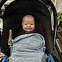 Oliver joined the competition — help win amazing prizes! baby, smile, blanket, car_seat, infant, child, indoor, happy, person, knitted, blue, black, seat, handle, plant, home, cozy, wrapped, cute, newborn
