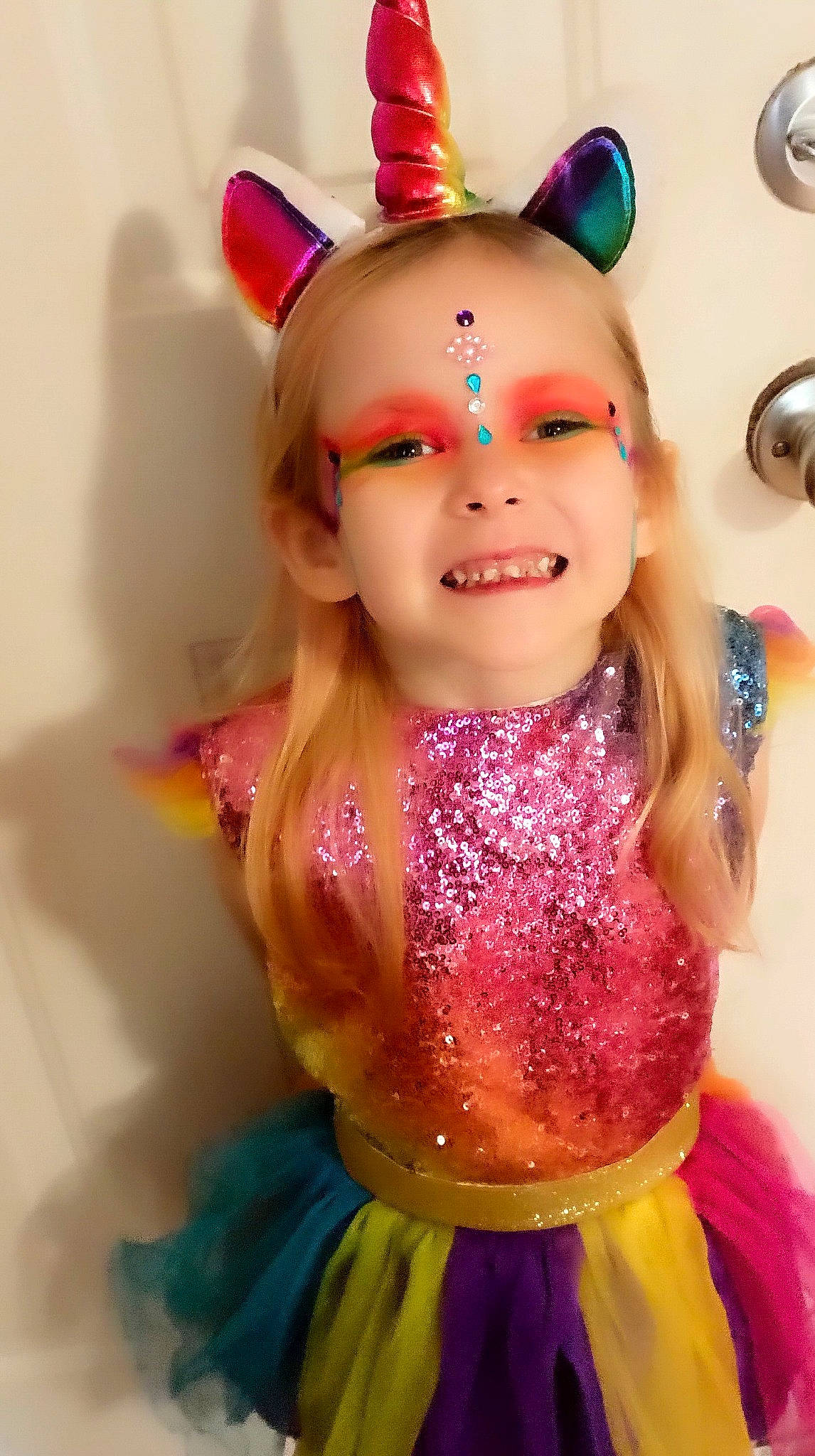 Hadley is registered to the contest to win money with this photo: costume, doll, event, eyelash, fashion_accessory, fashion_design, fawn, fun, fur, happy, headpiece, jewellery, joy, magenta, necklace, party_supply, person, pink, plastic, smile