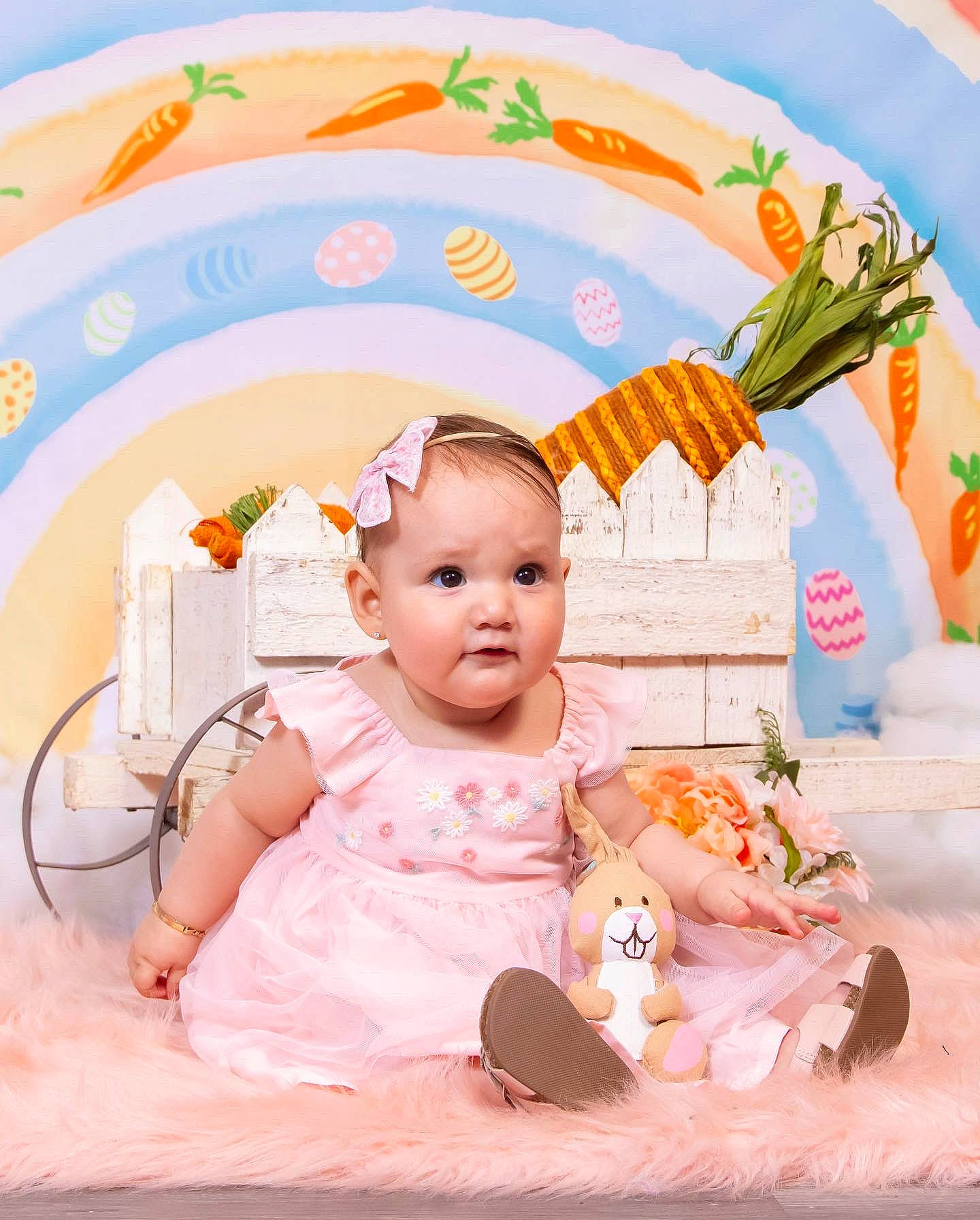 Micaela joined the competition — help win amazing prizes! baby, baby_products, baby_toddler_clothing, baby_toys, child, circle, fashion_accessory, fun, happy, headpiece, orange, peach, person, pink, product, room, sitting, sweetness, textile, toddler