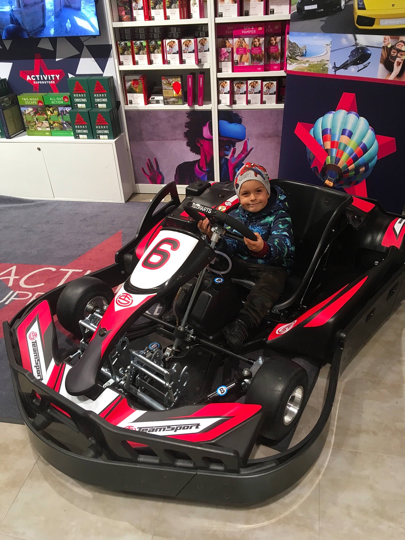 Andi Matias is registered to the contest to win money with this photo: auto_part, auto_racing, automotive_design, automotive_exterior, automotive_tire, automotive_wheel_system, car, carting, go_kart, headwear, helmet, joy, kart_racing, motorsport, person, personal_protective_equipment, racing, sports, vehicle, wheel