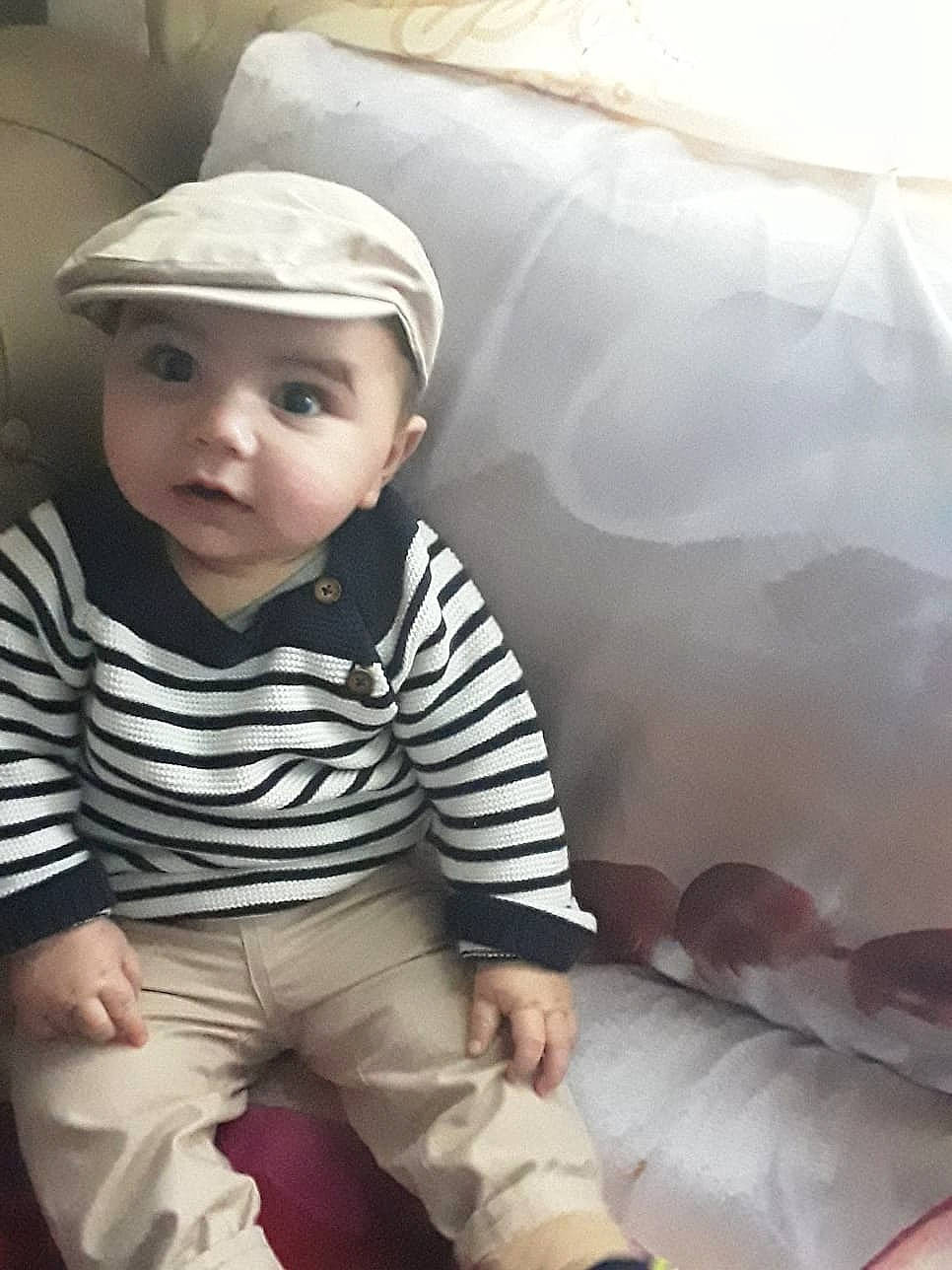 Thayalan participe au concours pour gagner de l'argent avec cette photo : baby, baby_toddler_clothing, beauty, cap, cheek, child, chin, comfort, cool, eye, flash_photography, gesture, hairstyle, happy, head, headwear, lip, person, skin, sleeve