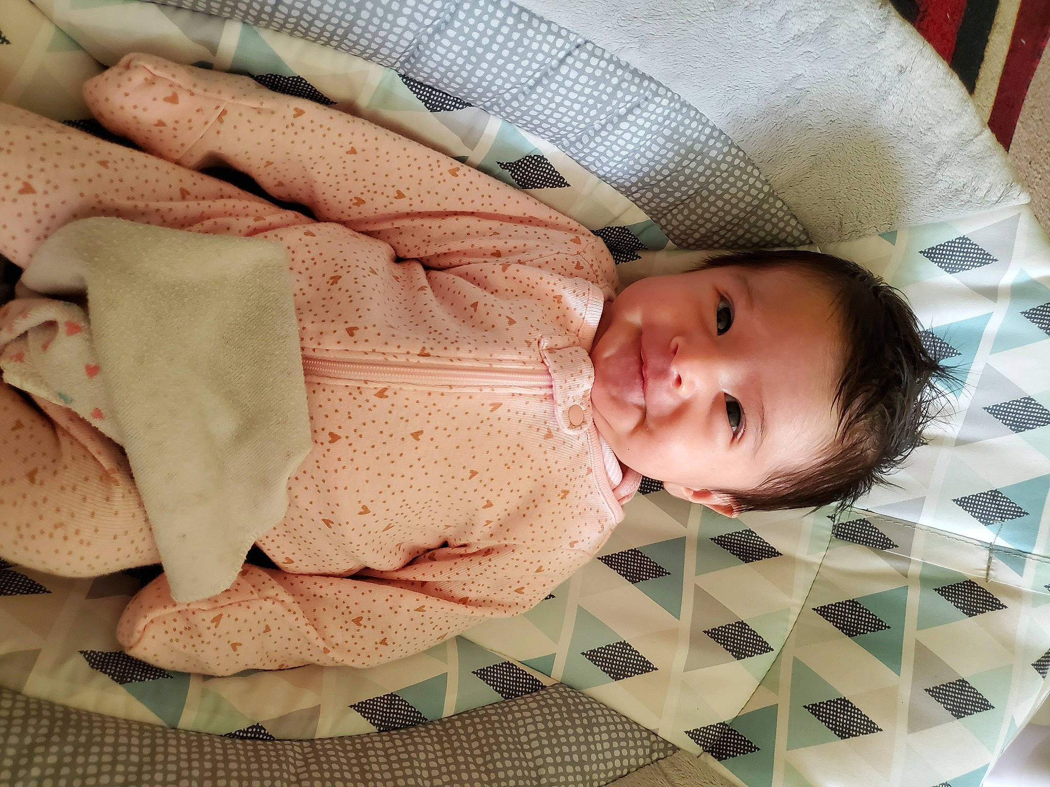 Eva is registered to the contest to win money with this photo: baby, baby_products, baby_safety, baby_toddler_clothing, beauty, cheek, child, comfort, eye, face, finger, head, linens, pattern, person, product, skin, sleeve, smile, thumb