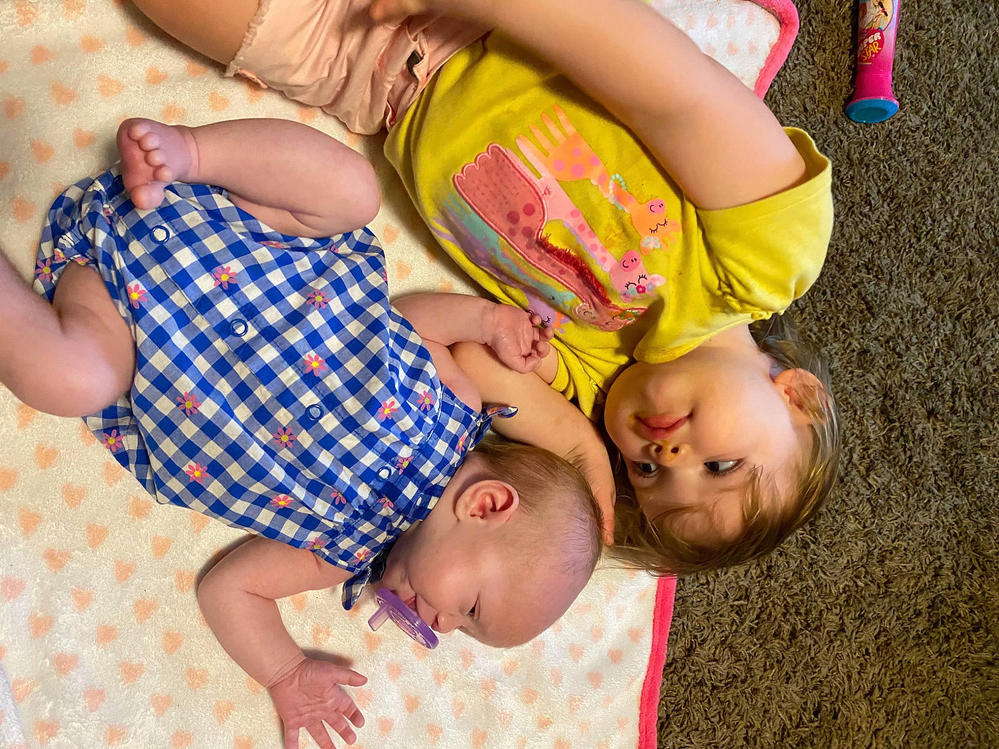 Brynlee is registered to the contest to win money with this photo: baby, child, family, fun, happy, leg, leisure, pattern, people, person, photography, plant, play, sibling, smile, summer, toddler, vacation