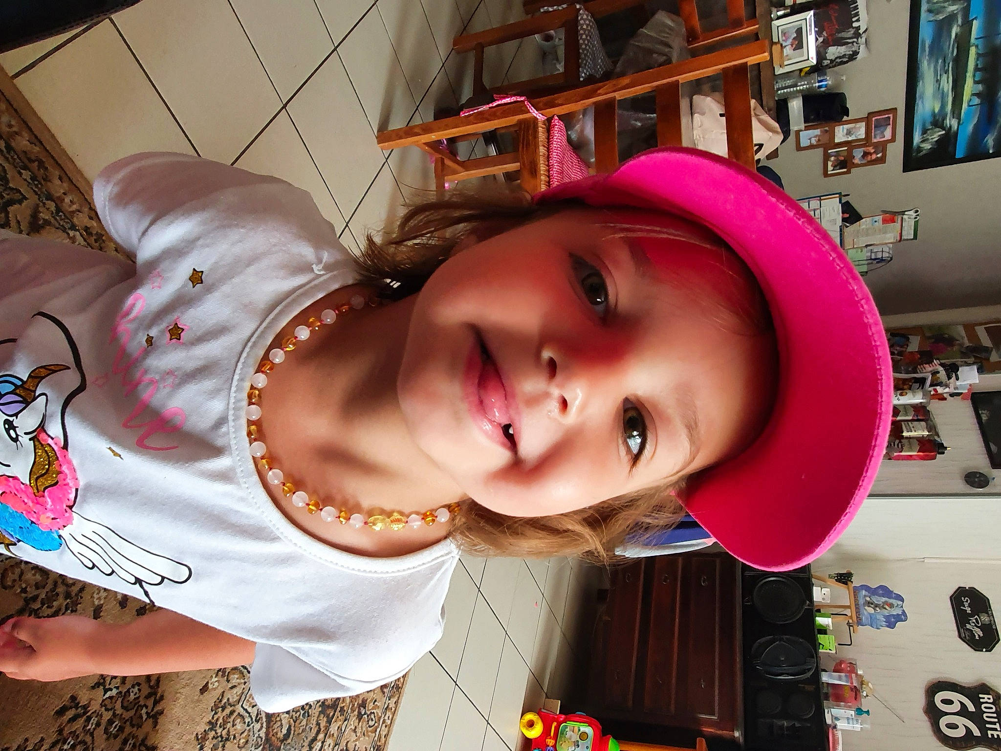 Zoë participe au concours pour gagner de l'argent avec cette photo : cheek, child, cool, ear, fun, happy, headgear, headwear, joy, lip, mouth, neck, nose, person, photography, pink, selfie, smile, vacation