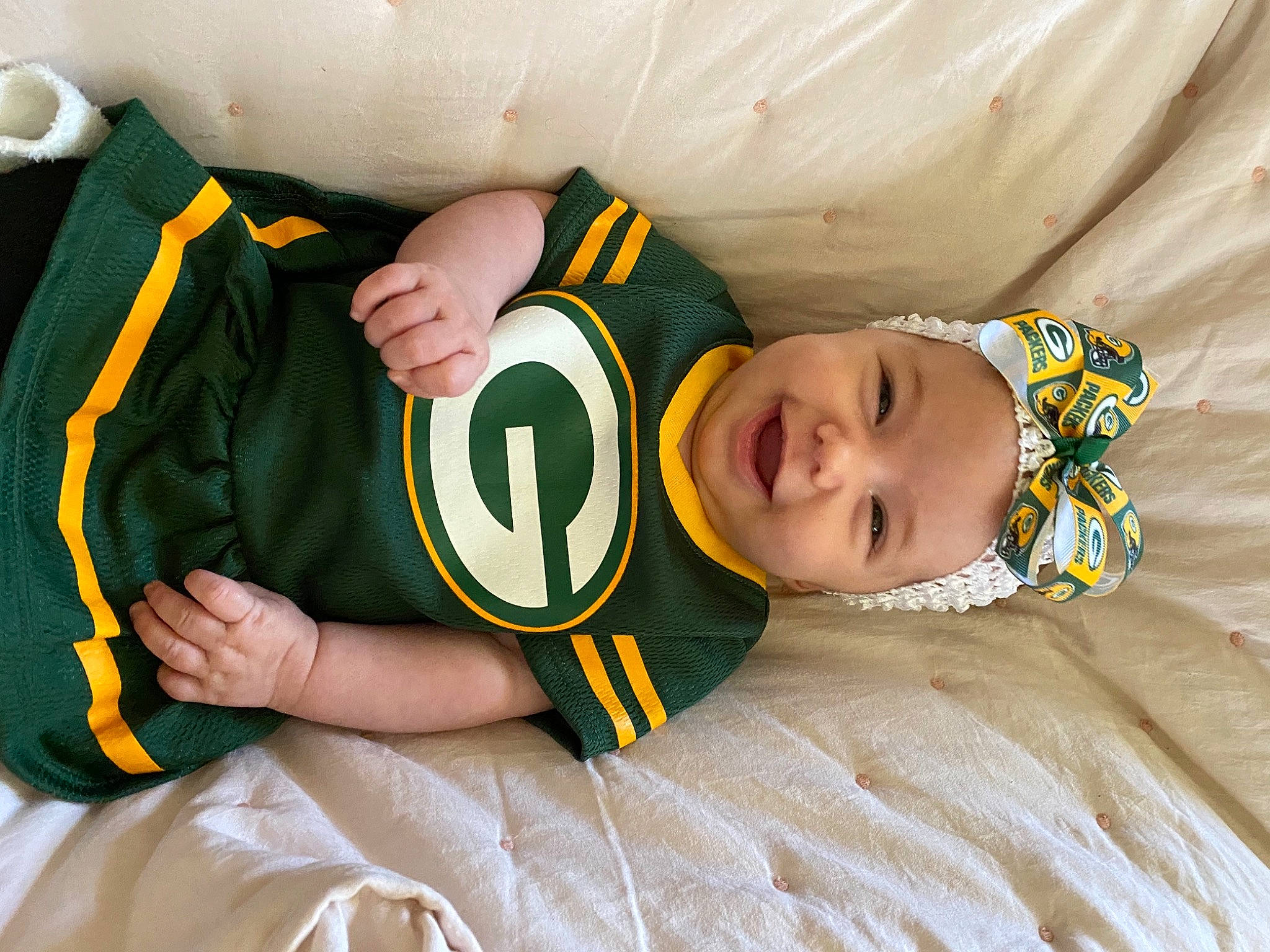 Luci is registered to the contest to win money with this photo: baby, child, headwear, joy, person, yellow