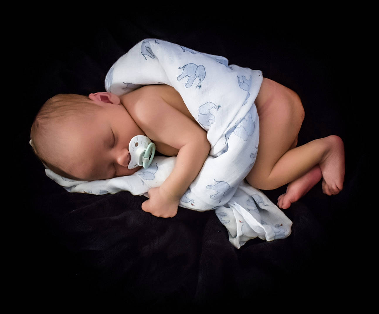 Ozzy is registered to the contest to win money with this photo: baby, baby_toddler_clothing, cheek, child, comfort, darkness, elbow, finger, flash_photography, gesture, grass, hand, human_leg, knee, linens, person, sitting, skin, sleeve, thigh