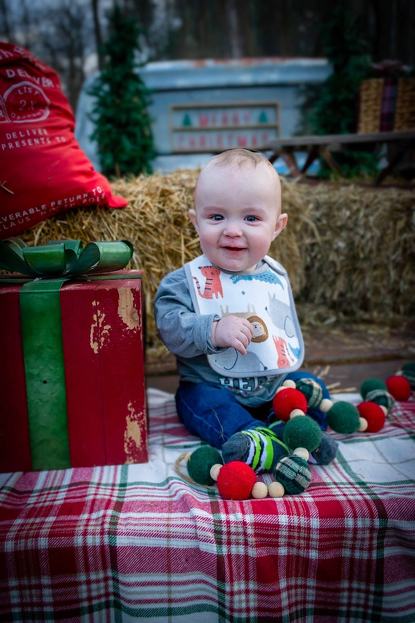 Easton joined the competition — help win amazing prizes! baby, baby_toddler_clothing, child, event, eye, fun, grass, green, happy, head, joy, pattern, person, plaid, plant, red, smile, standing, tartan, toddler