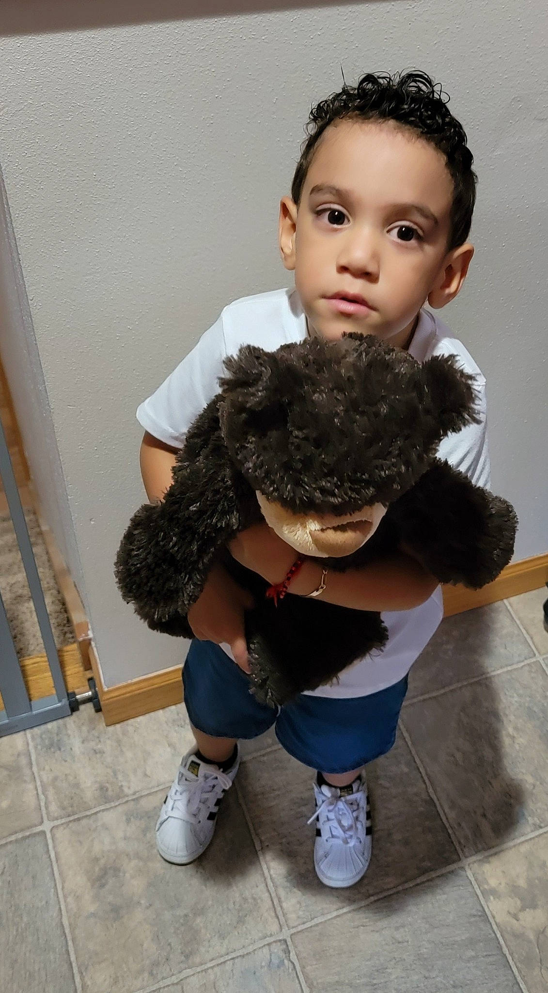 Dylan joined the competition — help win amazing prizes! black_hair, doll, fashion_design, flooring, fur, hairstyle, knee, leg, long_hair, person, shoe, shoulder, sitting, sleeve, sneakers, t_shirt, thigh, toy, trunk, waist