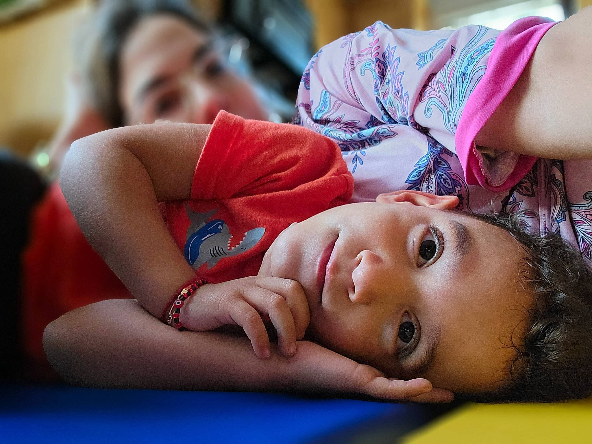 Dylan is registered to the contest to win money with this photo: arm, black_hair, child, comfort, eye, eyelash, flash_photography, fun, happy, human, joint, leisure, mouth, people, person, skin, smile, thigh, toddler, yellow