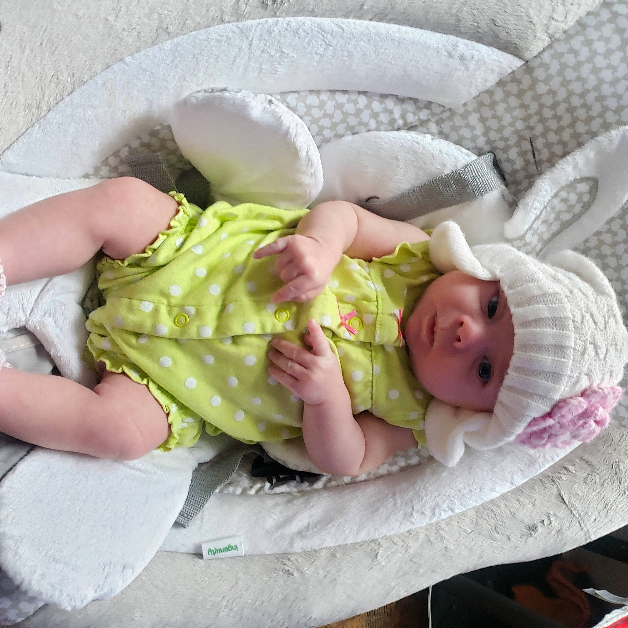 Emberly is registered to the contest to win money with this photo: baby, baby_products, baby_safety, baby_sleeping, baby_toddler_clothing, child, comfort, couch, foot, headgear, headwear, infant_bed, lap, linens, nap, person, pink, product, sitting, sleep