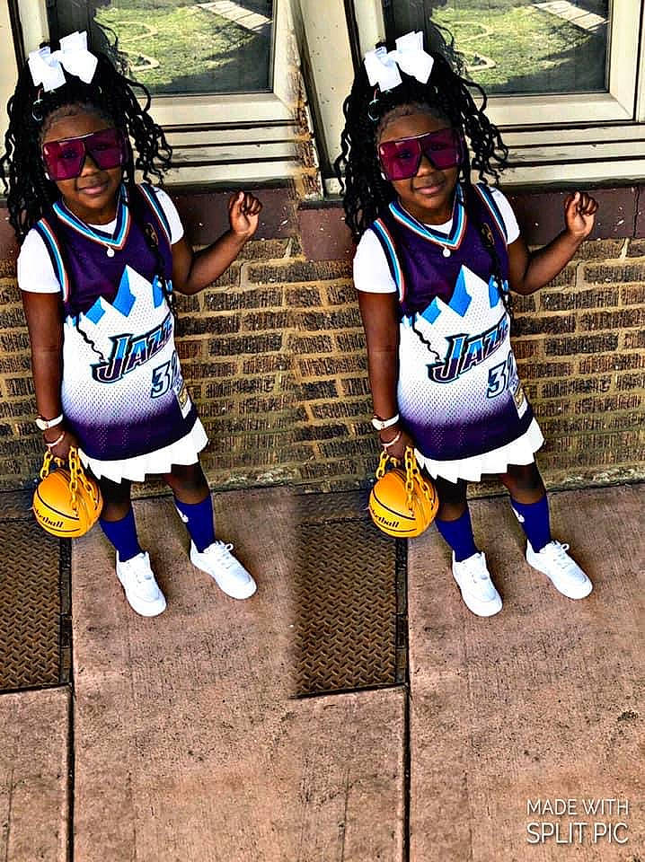 Kenyla Douglas is registered to the contest to win money with this photo: cool, facial_expression, glove, hairstyle, headgear, helmet, jersey, joy, person, player, public_space, shoe, shorts, smile, sneakers, sports_equipment, sports_gear, sports_uniform, sportswear, t_shirt