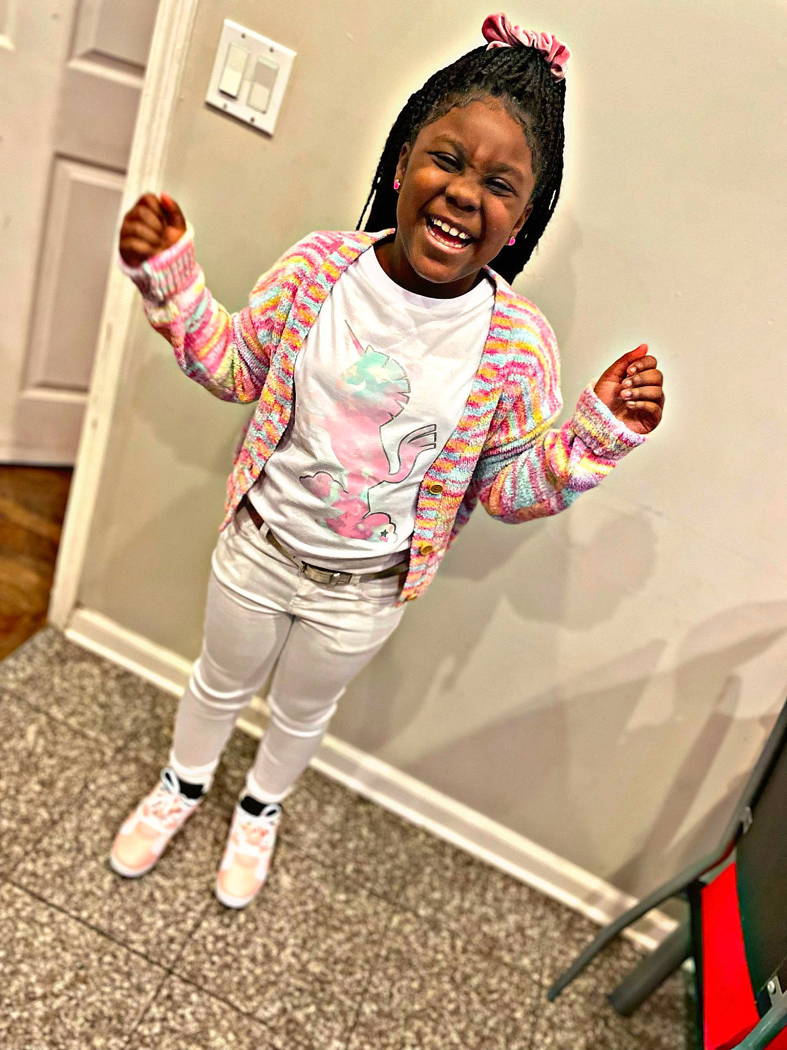 Kenyla is registered to the contest to win money with this photo: baby_toddler_clothing, child, door, dress, event, fun, gesture, happy, joy, leg, leisure, magenta, person, play, room, shoulder, sleeve, smile, sock, t_shirt
