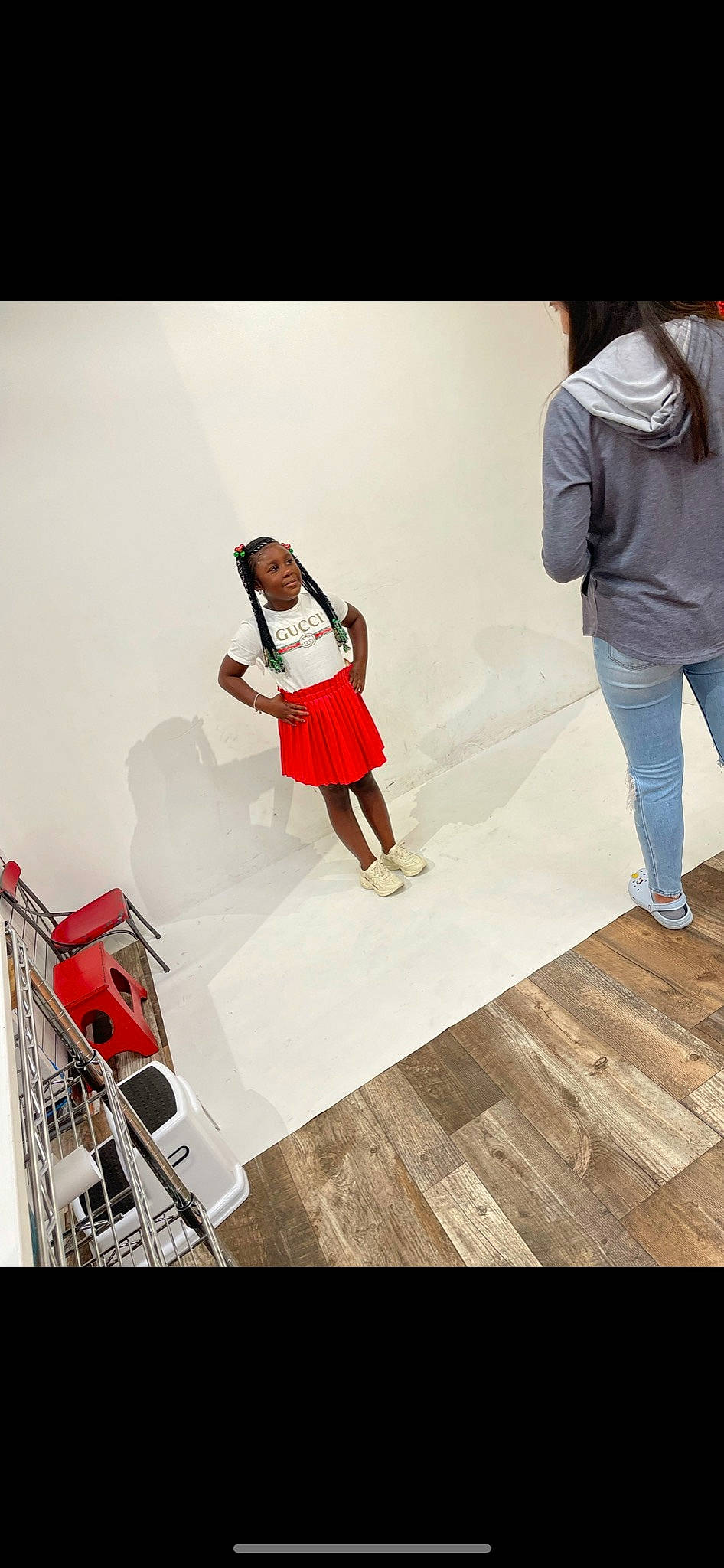 Kenyla is registered to the contest to win money with this photo: bag, fashion_design, floor, flooring, fun, gesture, human_leg, knee, leg, leisure, luggage_and_bags, person, shoe, shoulder, sleeve, sneakers, sportswear, street_fashion, t_shirt, thigh