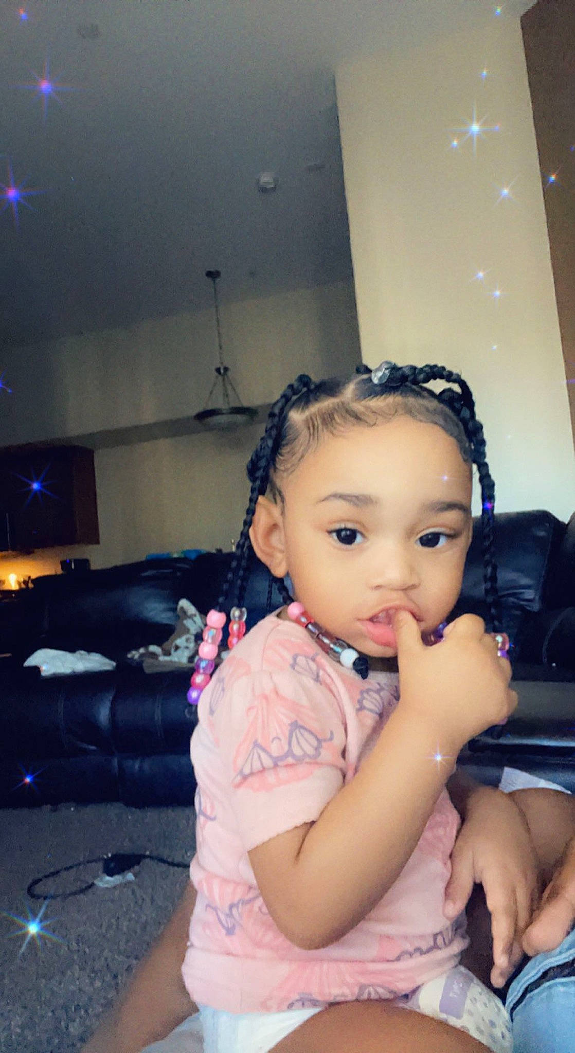 Aurora is registered to the contest to win money with this photo: audio_equipment, baby_toddler_clothing, black_hair, chair, cheek, child, ear, eyelash, flash_photography, fun, happy, jewellery, lip, nose, person, portrait_photography, room, sitting, skin, toddler