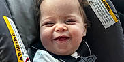 Rory is registered to the contest to win money with this photo: baby, car_seat, smiling, child, hair, seatbelt, infant, clothing, interior, car, cute, happy, face, young, child_safety, transportation, toddler, seat, person, straps