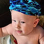 baby, blue, cheeks, child, closeup, curious, cute, expression, face, hat, headwear, high_chair, indoor, infant, patterned, person, plump, seated, skin, young