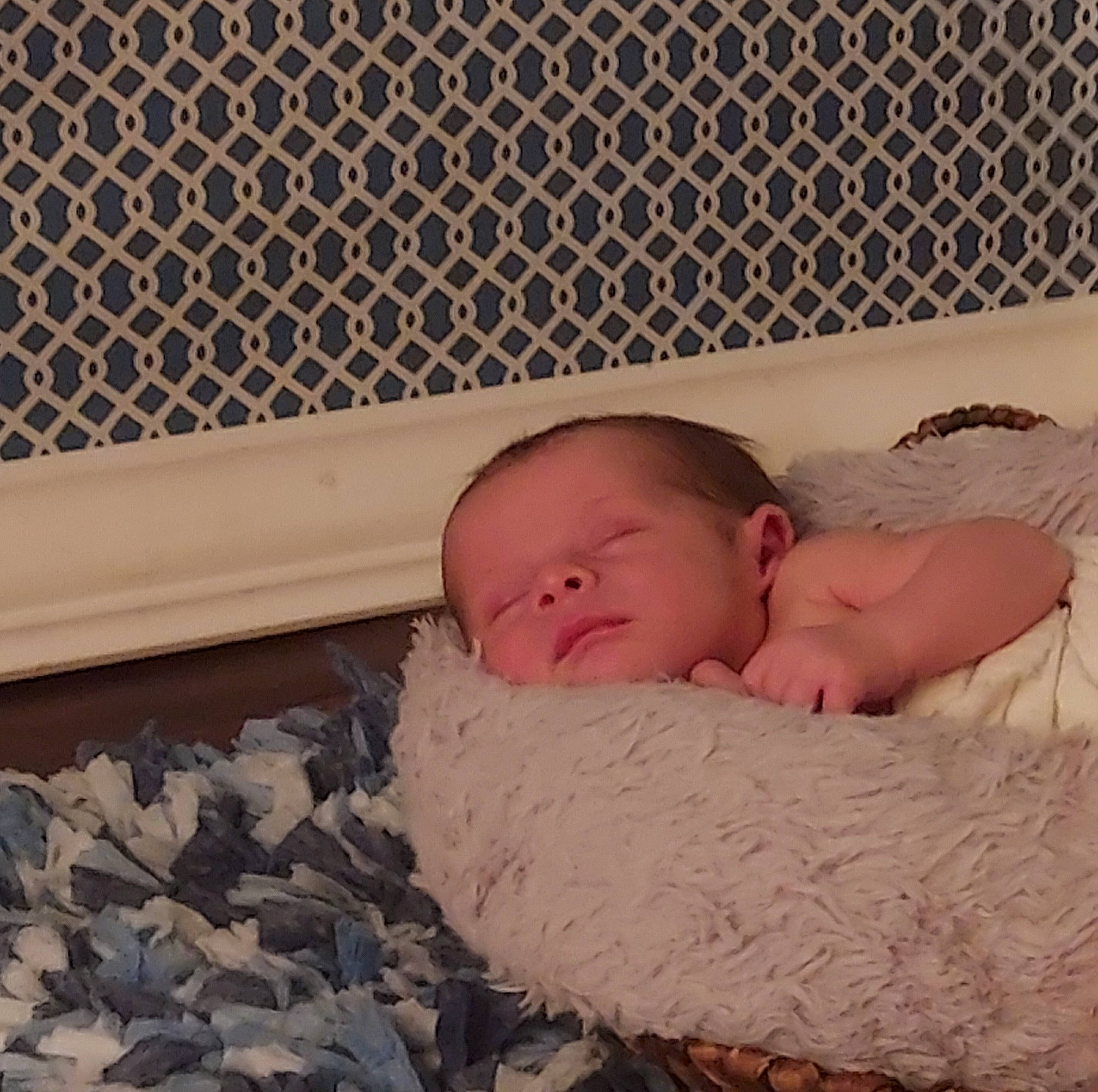 Apollo is registered to the contest to win money with this photo: baby, baby_products, baby_sleeping, baby_toddler_clothing, bedding, bedtime, cheek, child, comfort, face, flooring, head, human_body, linens, pattern, person, product, room, skin, toddler