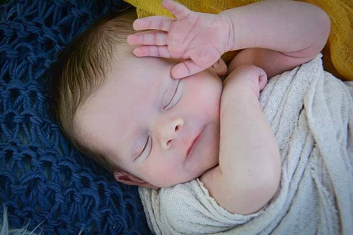 Apollo is registered to the contest to win money with this photo: baby, baby_sleeping, baby_toddler_clothing, cheek, child, comfort, ear, eye, eyelash, finger, gesture, happy, headgear, lip, mouth, neck, nose, person, skin, toddler