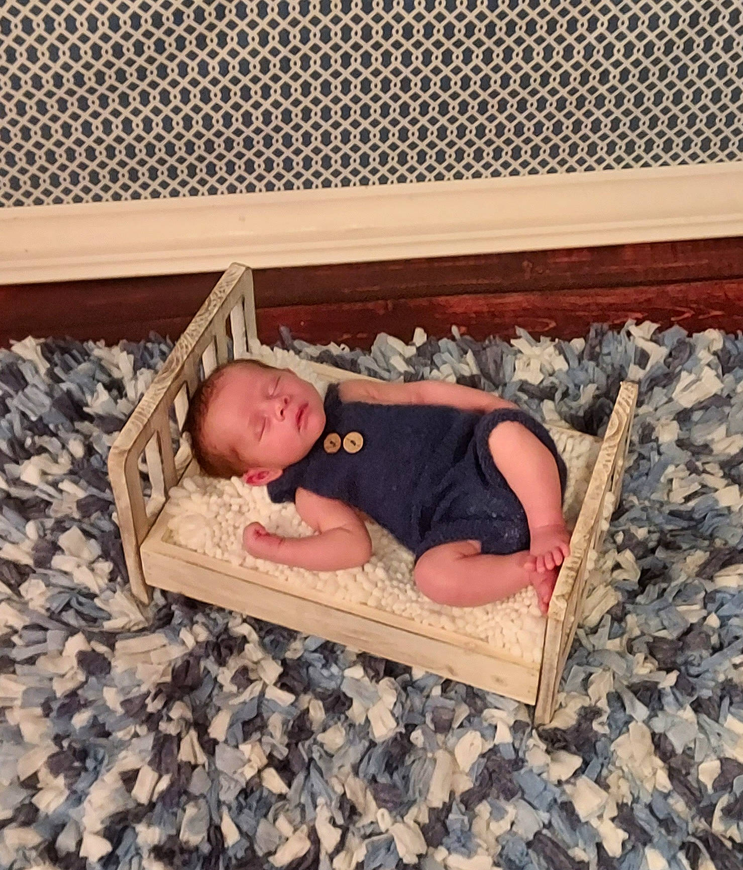 Apollo is registered to the contest to win money with this photo: baby, baby_products, baby_toddler_clothing, child, comfort, floor, flooring, foot, fun, hardwood, leg, leisure, linens, nap, person, room, sitting, sleep, thigh, toddler