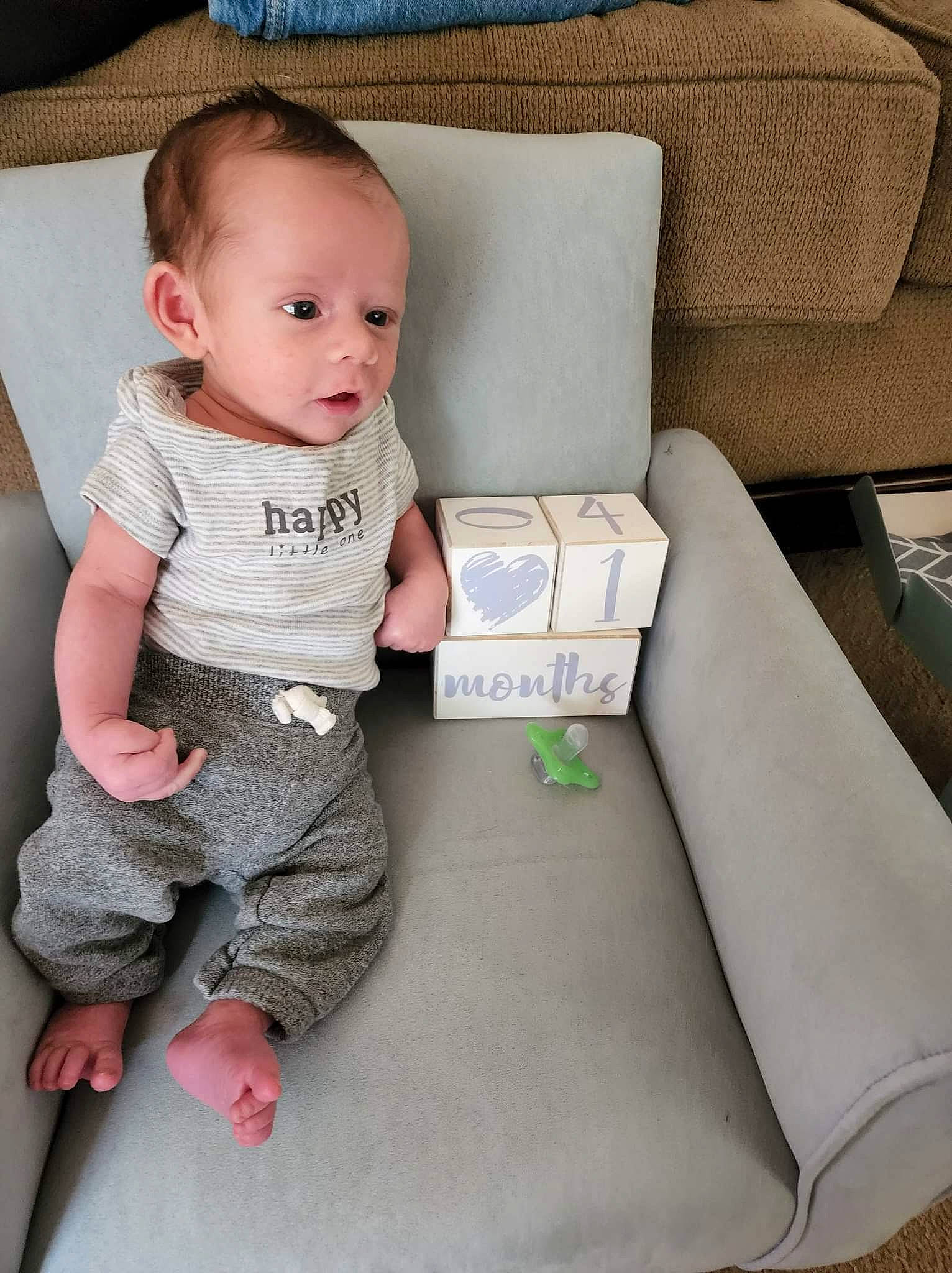 Apollo joined the competition — help win amazing prizes! armrest, baby, baby_toddler_clothing, chair, child, comfort, couch, flooring, furniture, knee, lap, pattern, person, product, room, sitting, sleeve, sock, sofa_bed, studio_couch