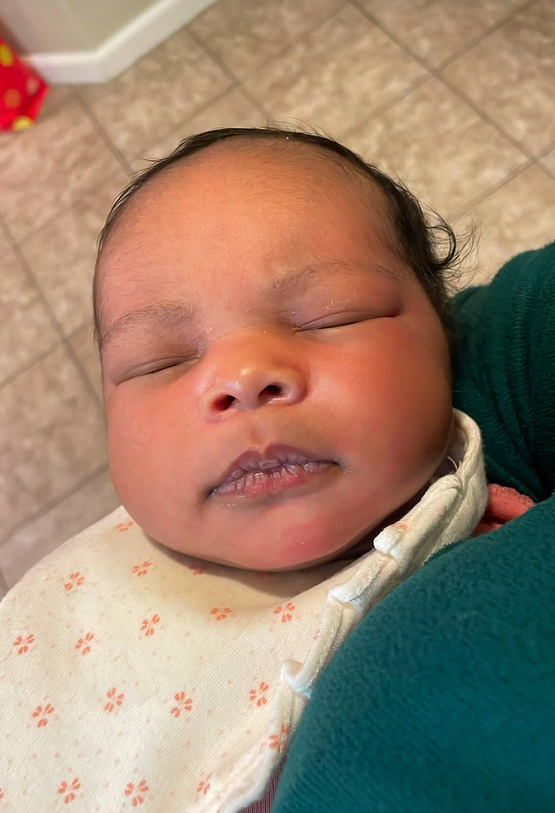 Vintage is registered to the contest to win money with this photo: baby, cheek, child, chin, close_up, comfort, eyebrow, facial_expression, forehead, fun, happy, human, linens, lip, mouth, neck, nose, person, skin, smile