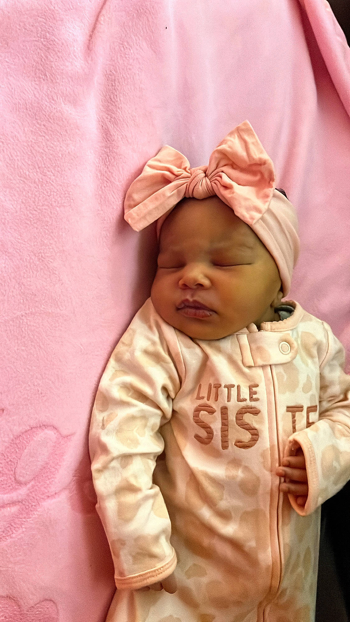 Vintage is registered to the contest to win money with this photo: baby, baby_products, baby_sleeping, baby_toddler_clothing, cheek, child, comfort, eye, facial_expression, finger, head, headgear, headwear, human_body, linens, lip, nose, person, pink, skin