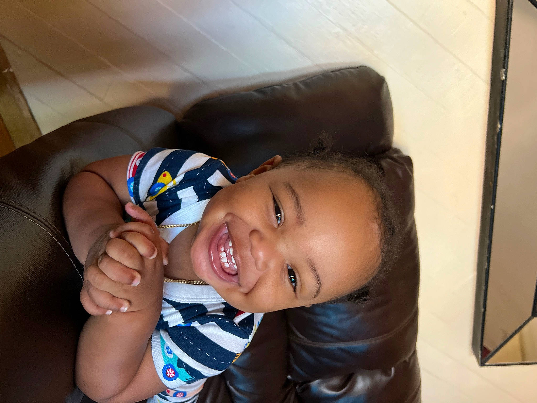 Monroe is registered to the contest to win money with this photo: arm, ball, black_hair, comfort, elbow, electric_blue, eye, finger, flash_photography, football, fun, happy, head, joy, knee, leg, mouth, person, smile, thigh