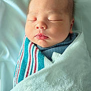 Aurelio is registered to the contest to win money with this photo: newborn, baby, sleeping, swaddled, blanket, hospital, infant, peaceful, soft, portrait, child, cute, wrapped, closeup, face, babyclothes, resting, indoors, person, head