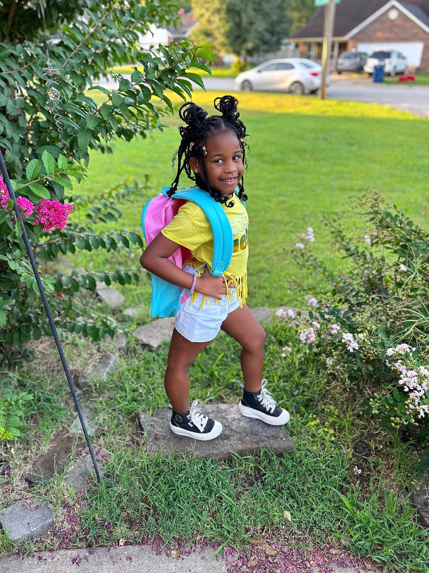 Alexandria joined the competition — help win amazing prizes! car, child, clothing, face, female, footwear, girl, hair, head, machine, nature, outdoors, person, shoe, shorts, sitting, transportation, vehicle, wheel, yard