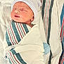 Kayden Jackowicz joined the competition — help win amazing prizes! newborn, baby, sleeping, blanket, hospital, striped_blanket, striped_cap, infant, face, wrapped, soft, bed, swaddled, closed_eyes, person, newborn_care, healthcare, quiet, resting, cute